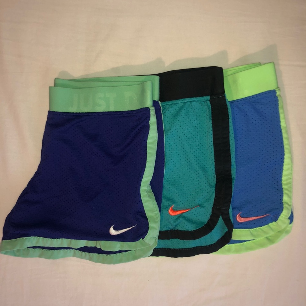 Three pairs of Nike athletic shorts